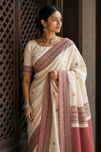 Tora — Ivory Assam Mercerized Cotton Saree with Red Motif Border