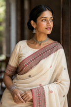 Tora — Ivory Assam Mercerized Cotton Saree with Red Motif Border