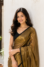 Rukmini — Antique Gold Tissue Saree with Black Border | Awadhalaya