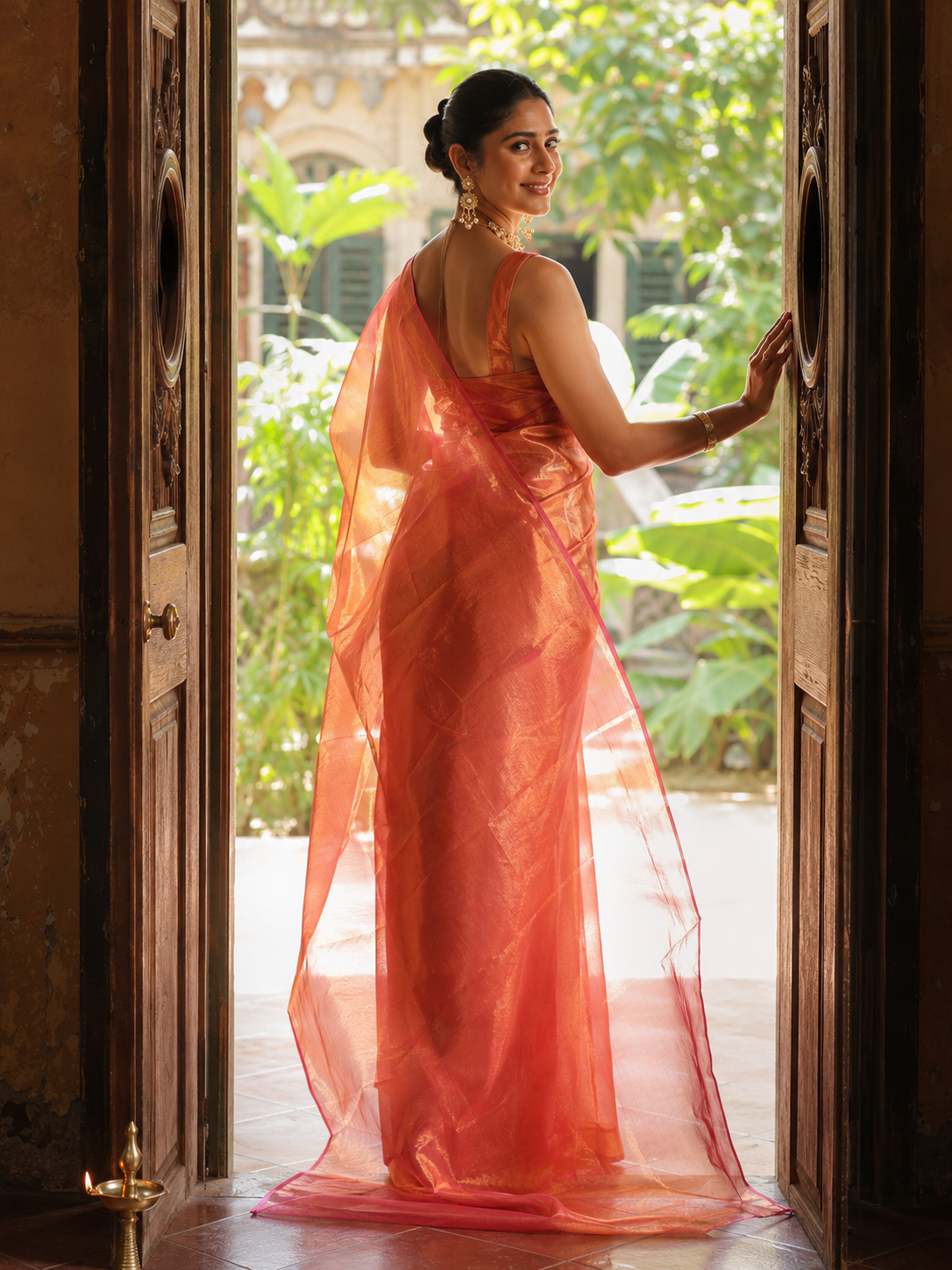 Tamra — Coppery Tissue Saree with a Sheer Pallu | Awadhalaya