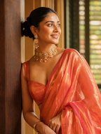 Tamra — Coppery Tissue Saree with a Sheer Pallu | Awadhalaya