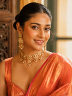 Tamra — Coppery Tissue Saree with a Sheer Pallu | Awadhalaya