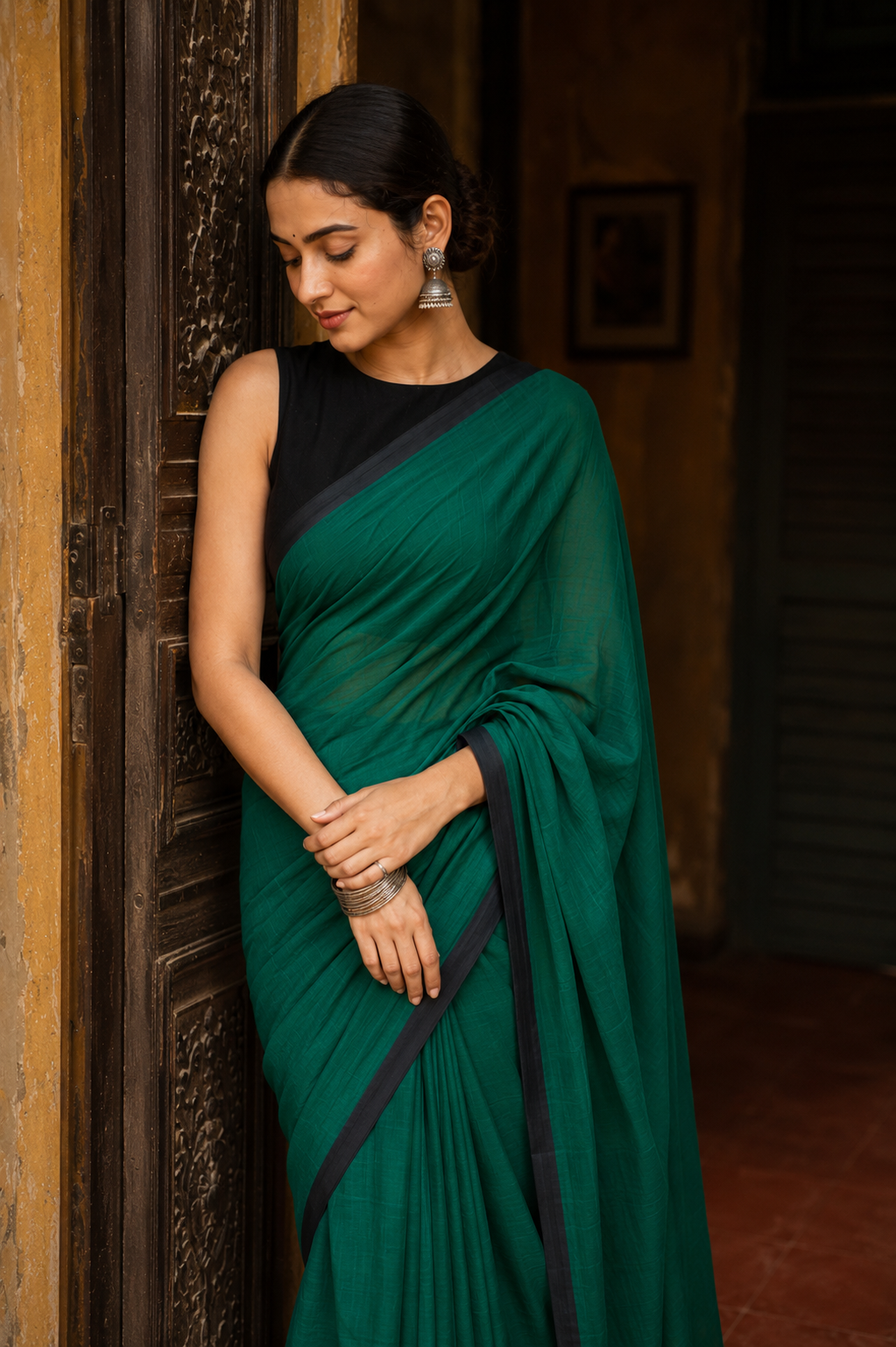 Panna — Deep Green Saree with Black Border & Tasselled Pallu