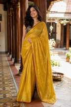Kanchan — Mustard-Gold Tissue Saree with Red Selvedge | Awadhalaya
