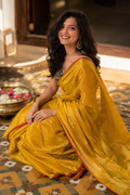 Kanchan — Mustard-Gold Tissue Saree with Red Selvedge | Awadhalaya