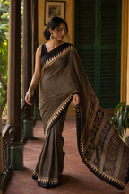 Kasturi — Black Geometric Stripe Modal Silk Saree | Awadhalaya