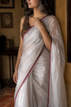 Chandrika — Silver Tissue Saree with Maroon Border | Awadhalaya