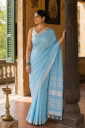 Akasha — Sky-Blue Linen Saree with Silver-Toned Border | Awadhalaya