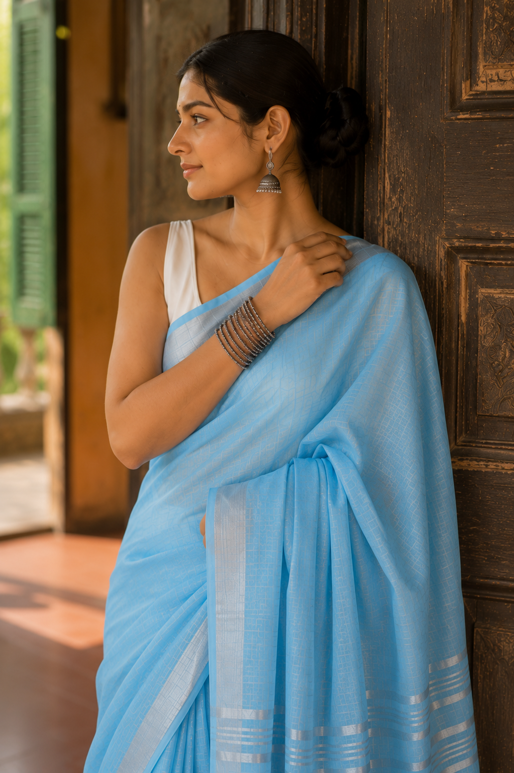 Akasha — Sky-Blue Linen Saree with Silver-Toned Border | Awadhalaya