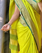 Roshni Raw Mango mulmul saree — pallu and tassel detail with mirror shot